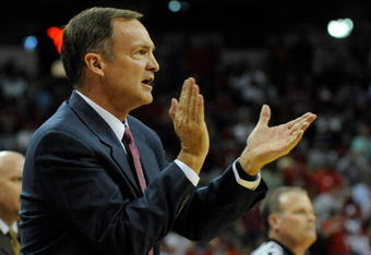 LAS VEGAS - NOVEMBER 28:  Head coach Lon Kruger of the UNLV Rebels applauds his players as they take on the Louisville Cardinals at the Thomas & Mack Center November 28, 2009 in Las Vegas, Nevada. The Rebels defeated the Cardinals 76-71.  (Photo by Ethan Miller/Getty Images)