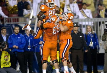 TAMPA - DECEMBER 05:  Running back C.J. Spiller #28 of the Clemson Tigers celebrates his touchdown against the Georgia Tech Yellow Jackets in the 2009 ACC Football Championship game at Raymond James Stadium on December 5, 2009 in Tampa, Florida.  (Photo by J. Meric/Getty Images)