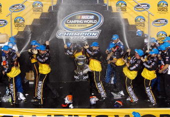 HOMESTEAD, FL - NOVEMBER 20:  Ron Hornaday Jr. , driver of the #33 Longhorn Chevrolet, celebrates winning the series title in Victory Lane with his crew members after finishing 8th in the NASCAR Camping World Truck Series Ford 200 at Homestead-Miami Speedway on November 20, 2009 in Homestead, Florida.  (Photo by Chris Graythen/Getty Images)