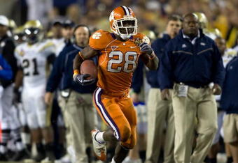 TAMPA, FL - DECEMBER 05:  Running back C.J. Spiller #28 of the Clemson Tigers runs the ball against the Georgia Tech Yellow Jackets in the 2009 ACC Football Championship game at Raymond James Stadium on December 5, 2009 in Tampa, Florida.  (Photo by J. Meric/Getty Images)