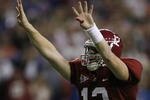 ATLANTA - DECEMBER 5:  Quarterback Greg McElroy #12 of the Alabama Crimson Tide celebrates after Mark Ingram #22 scored a 1-yard touchdown in the fourth quarter against the Florida Gators during the SEC Championship game at Georgia Dome on December 5, 2009 in Atlanta, Georgia.  (Photo by Kevin C. Cox/Getty Images)