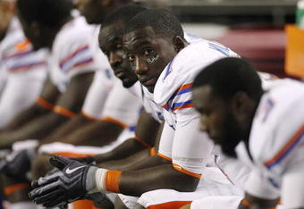 ATLANTA - DECEMBER 5:  Justin Williams #7 of the Florida Gators looks on dejected from the bench against the Alabama Crimson Tide during the SEC Championship game at Georgia Dome on December 5, 2009 in Atlanta, Georgia.  (Photo by Chris Graythen/Getty Images)