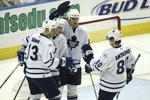 TAMPA, FL - JANUARY 16:  (L to R) Mats Sundin #13, Alexei Ponikarovsky #23, Pavel Kubina #31 and Nik Antropov #80 of the Toronto Maple Leafs celebrate Ponikarovsky's empty net goal to close out the scoring against the Tampa Bay Lightning at the St. Pete Times Forum on January 16, 2007 in Tampa, Florida. The Leafs defeated the Lightning 4-2.  (Photo by Doug Benc/Getty Images)