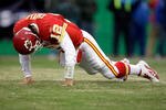 KANSAS CITY, MO - DECEMBER 06:  Quarterback Brodie Croyle #12 of the Kansas City Chiefs is slow to get up after being hit during the game against the Denver Broncos on December 6, 2009 at Arrowhead Stadium in Kansas City, Missouri.  (Photo by Jamie Squire/Getty Images)