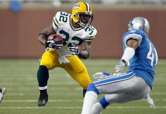 DETROIT , MI - NOVEMBER 26:  Brandon Jackson #32 of the Green Bay Packers carries the ball against the Detroit Lions on November 26, 2009 at Ford Field in Detroit, Michigan. Green Bay won the game 34-12. (Photo by Gregory Shamus/Getty Images)