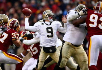 LANDOVER, MD - DECEMBER 06:  Drew Brees #9 of the New Orleans Saints throws a pass against the Washington Redskins on December 6, 2009 at FedExField in Landover, Maryland.  (Photo by Chris McGrath/Getty Images)