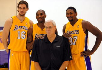 EL SEGUNDO, CA - SEPTEMBER 29:  Pau Gasol #16, Kobe Bryant #24, Coach Phil Jackson and Ron Artest #37 of the Los Angeles Lakers pose for a photograph during Lakers media day at their training facility on  September 29, 2009 in El Segundo, California. NOTE TO USER: User expressly acknowledges and agrees that, by downloading and/or using this Photograph, user is consenting to the terms and conditions of the Getty Images License Agreement.  (Photo by Kevork Djansezian/Getty Images)