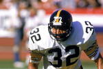 1984:  Running back Franco Harris #32 of the Pittsburgh Steelers runs during a game in the 1984 NFL season.  (Photo by Rick Stewart/Getty Images)