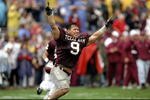 14 Nov 1998:  Inside lineback Dat Nguyen #9 of the Texas A&M Aggies celebrates during a game against the Missouri Tigers at Kyle Field in College Station, Texas. The Aggies defeated the Tigers 17-14. Mandatory Credit: Stephen Dunn  /Allsport