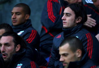 BLACKBURN, ENGLAND - DECEMBER 05: Alberto Aquilani of Liverpool watches from the bench during the Barclays Premier League match between Blackburn Rovers and Liverpool at Ewood Park on December 5, 2009 in Blackburn, England.  (Photo by Clive Brunskill/Getty Images)