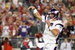 GLENDALE, AZ - DECEMBER 06:  Quarterback Brett Favre #4 of the Minnesota Vikings throws a first quarter touchdown during the NFL game against the Arizona Cardinals at the Universtity of Phoenix Stadium on December 6, 2009 in Glendale, Arizona.  The Cardinals defeated the Vikings 30-17.  (Photo by Christian Petersen/Getty Images)