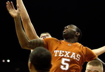 KANSAS CITY, MO - NOVEMBER 23:  Damion James #5 of the Texas Longhorns battles for a rebound during the CBE Classic semifinal game against the Iowa Hawkeyes on November 23, 2009 at Sprint Center in Kansas City, Missouri.  (Photo by Jamie Squire/Getty Images)