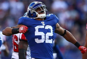 EAST RUTHERFORD, NJ - NOVEMBER 22: Michael Boley #52 of the the New York Giants celebrates after sacking quarterback Matt Ryan #2 of the Atlanta Falcons on November 22, 2009 at Giants Stadium in East Rutherford, New Jersey.  (Photo by Chris McGrath/Getty Images)