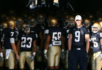 SOUTH BEND, IN - NOVEMBER 21: Members of the Notre Dame Fighting Irish wait to walk out of the tunnel before lining up to enter the field for a game against the Univeristy of Connecticut Huskies at Notre Dame Stadium on November 21, 2009 in South Bend, Indiana. (Photo by Jonathan Daniel/Getty Images)