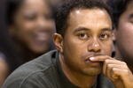 LOS ANGELES - FEBRUARY 18:  Golfer Tiger Woods attends the game between the Los Angeles Lakers and the Houston Rockets on February 18, 2003 at Staples Center in Los Angeles, Caifornia. (Photo by Vince Bucci/Getty Images)