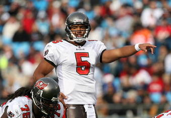CHARLOTTE, NC - DECEMBER 06:  Josh Freeman #5 of the Tampa Bay Buccaneers calls a play against the Carolina Panthers at Bank of America Stadium on December 6, 2009 in Charlotte, North Carolina.  (Photo by Streeter Lecka/Getty Images)