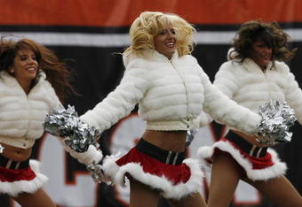 CINCINNATI, OH - DECEMBER 6: Cheerleaders for the Cincinnati Bengals cheers for their team against the Detroit Lions in their NFL game at Paul Brown Stadium December 6, 2009 in Cincinnati, Ohio.    (Photo by John Sommers II/Getty Images)