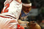 CHICAGO - FEBRUARY 22: Allen iverson #3 of the Denver Nuggets drives against Kirk Hinrich #12 of the Chicago Bulls on February 22, 2008 at the United Center in Chicago, Illinois. The Bulls defeated the Nuggets 135-121. NOTE TO USER: User expressly acknowledges and agreees that, by downloading and/or using this Photograph, User is consenting to the terms and conditions of the Getty Images License Agreement. (Photo by Jonathan Daniel/Getty Images)