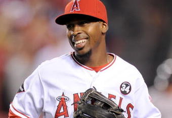 ANAHEIM, CA - OCTOBER 08:  Chone Figgins #9 of the Los Angeles Angels of Anaheim walks off the field after the final out in the sixth inning against the Boston Red Sox in Game One of the ALDS during the 2009 MLB Playoffs at Angel Stadium on October 8, 2009 in Anaheim, California.  (Photo by Lisa Blumenfeld/Getty Images)
