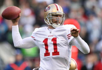 SEATTLE - DECEMBER 06:  Quarterback Alex Smith #11 of the San Francisco 49ers passes against the Seattle Seahawks on December 6, 2009 at Qwest Field in Seattle, Washington. The Seahawks defeated the 49ers 20-17. (Photo by Otto Greule Jr/Getty Images)