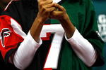 ATLANTA - DECEMBER 06:  A fan wears a split-team #7 jersey for Michael Vick #7 (not pictured) of the Philadelphia Eagles during the game against the Atlanta Falcons at Georgia Dome on December 6, 2009 in Atlanta, Georgia.  (Photo by Kevin C. Cox/Getty Images)