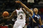 MILWAUKEE - NOVEMBER 16: Brandon Jennings #3 of the Milwuakee Bucks puts up a shot against Shawn Marion #0 of the Dallas Mavericks at the Bradley Center on November 16, 2009 in Milwaukee, Wisconsin. The Mavericks defeated the Bucks 115-113 in overtime. (Photo by Jonathan Daniel/Getty Images)