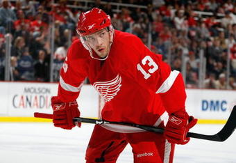 DETROIT - OCTOBER 10:  Pavel Datsyuk #13 of the Detroit Red Wings looks on during the game against the Washington Capitals on October 10, 2009 at Joe Louis Arena in Detroit, Michigan. (Photo by Gregory Shamus/Getty Images)