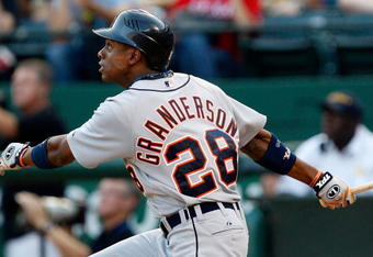 ARLINGTON, TX - JULY 29:  Center fielder Curtis Granderson #28 of the Detroit Tigers hits his second home run of the game in the second inning against the Texas Rangers on July 29, 2009 at Rangers Ballpark in Arlington, Texas.  (Photo by Ronald Martinez/Getty Images)