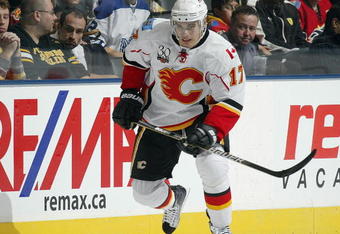 TORONTO, ON - NOVEMBER 14:  Rene Bourque #17 of the Calgary Flames skates after the puck in a game against the Toronto Maple Leafs on November 14,2009 at the Air Canada Centre in Toronto, Ontario. The Flames won 5-2. (Photo by Claus Andersen/Getty Images) 