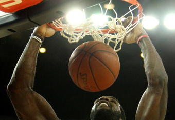 OAKLAND, CA - NOVEMBER 20:  Greg Oden #52 of the Portland Trail Blazers dunks against the Golden State Warriors during an NBA game at Oracle Arena on November 20, 2009 in Oakland, California.  (Photo by Jed Jacobsohn/Getty Images)