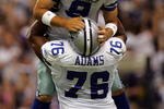 DALLAS - SEPTEMBER 15:  Quarterback Tony Romo #9 of the Dallas Cowboys celebrates a touchdown pass with Flozell Adams #76 against the Philadelphia Eagles in the first quarter at Texas Stadium on September 15, 2008 in Irving, Texas.  (Photo by Ronald Martinez/Getty Images)