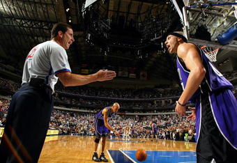 DALLAS - APRIL 24:  Guard Mike Bibby #10 of the Sacramento Kings argues with official Tim Donaghy #21 during play against the Dallas Mavericks in game three of the first round of the NBA Western Conference Playoffs on April 24, 2004 at the American Airlines Center in Dallas, Texas.  NOTE TO USER: User expressly acknowledges and agrees that, by downloading and/or using this Photograph, User is consenting to the terms and conditions of the Getty Images License Agreement.  (Photo by Ronald Martinez/Getty Images)