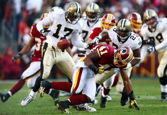 LANDOVER, MD - DECEMBER 06:  Robert Meachem #17 of the New Orleans Saints catches a fumble by Kareem Moore #41of the Washington Redskins on December 6, 2009 at FedExField in Landover, Maryland.  (Photo by Chris McGrath/Getty Images)