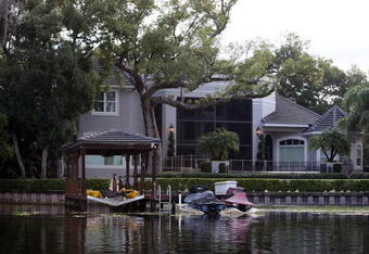 WINDERMERE, FL - DECEMBER 03:  The back of Tiger Woods home is seen on December 3, 2009 in Windermere, Florida.  Tiger Woods crashed his SUV into a fire hydrant and tree next to his Florida home in the early hours of November 27.  (Photo by Joe Raedle/Getty Images)