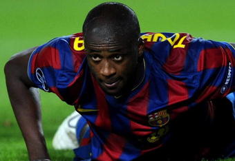 BARCELONA, SPAIN - OCTOBER 20:  Yaya Toure of FC Barcelona lays on the pitch after failing to score during the UEFA Champions League group F match between FC Barcelona and FC Rubin Kazan at the Camp Nou Stadium on October 20, 2009 in Barcelona, Spain. FC Barcelona lost the match2-1.  (Photo by Jasper Juinen/Getty Images)