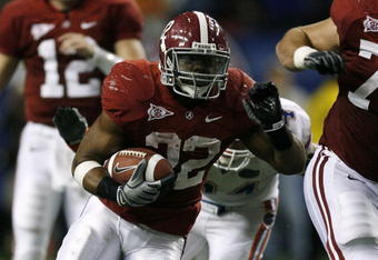 ATLANTA - DECEMBER 5:  Mark Ingram #22 of the Alabama Crimson Tide runs the ball in the second half against the Florida Gators during the SEC Championship game at Georgia Dome on December 5, 2009 in Atlanta, Georgia.  (Photo by Kevin C. Cox/Getty Images)