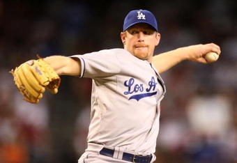 PHOENIX - AUGUST 16:  Starting pitcher Randy Wolf #43 of the Los Angeles Dodgers pitches against the Arizona Diamondbacks during the major league baseball game at Chase Field on August 16, 2009 in Phoenix, Arizona.  (Photo by Christian Petersen/Getty Images)