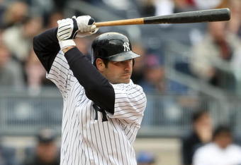 NEW YORK - APRIL 04:  Xavier Nady #22 of the New York Yankees at bat against the Chicago Cubs during their game on April 4, 2009 at Yankee Stadium in the Bronx borough of New York City.  (Photo by Nick Laham/Getty Images)