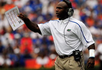 GAINESVILLE, FL - SEPTEMBER 12:  Defensive coordinator Charlie Strong of the Florida Gators calls out a signal during the game against the Troy Trojans at Ben Hill Griffin Stadium on September 12, 2009 in Gainesville, Florida.  (Photo by Sam Greenwood/Getty Images)
