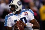 INDIANAPOLIS, IN - DECEMBER 6: Quarterback Vince Young #10 of the Tennessee Titans runs with the football against the Indianapolis Colts at Lucas Oil Field on December 6, 2009 in Indianapolis, Indiana. The Colts defeated the Titans 27-17. (Photo by Scott Boehm/Getty Images)