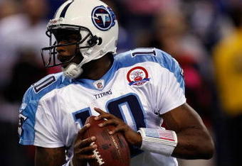 INDIANAPOLIS, IN - DECEMBER 6: Quarterback Vince Young #10 of the Tennessee Titans runs with the football against the Indianapolis Colts at Lucas Oil Field on December 6, 2009 in Indianapolis, Indiana. The Colts defeated the Titans 27-17. (Photo by Scott Boehm/Getty Images)