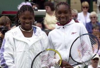 6 Jul 2000:  The Williams sisters Venus and Serena pose for photographers befor their semi final match in the womens singles in the Wimbledon Lawn Tennis Championship at the All England Lawn Tennis and Croquet Club, Wimbledon, London. Mandatory Credit: Clive Brunskill/ALLSPORT