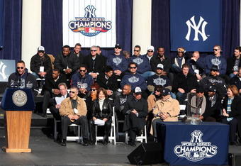 NEW YORK - NOVEMBER 06:  Captain Derek Jeter #2 (L) of the New York Yankees speaks on behalf of his team during the New York Yankees World Series Victory Celebration at City Hall on November 6, 2009 in New York, New York.  (Photo by Jim McIsaac/Getty Images)