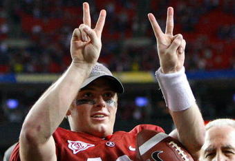 ATLANTA - DECEMBER 05:  Quarterback Greg McElroy #12 of the Alabama Crimson Tide celebrates after their 32-13 win over the Florida Gators in the SEC Championship at Georgia Dome on December 5, 2009 in Atlanta, Georgia.  (Photo by Kevin C. Cox/Getty Images)