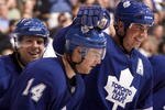 TORONTO - NOVEMBER 23:  Matt Stajan #14, Tomas Kaberle #15 and Phil Kessel #81 of the Toronto Maple Leafs celebrate goal against he New York Islanders during game action November 23, 2009 at the Air Canada Centre in Toronto, Ontario, Canada. (Photo by Abelimages/Getty Images)