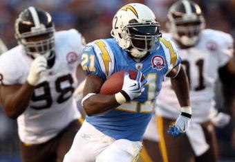 SAN DIEGO, CA - OCTOBER 19:  Runningback LaDainian Tomlinson #21 of the San Diego Chargers runs against the Denver Broncos during Monday Night Football on October 19, 2009 at Qualcomm Stadium in San Diego, California. (Photo by Donald Miralle/Getty Images)