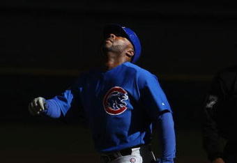 MILWAUKEE - APRIL 10: Milton Bradley #21 of the Chicago Cubs looks to the sky after hitting a home run  against the Milwaukee Brewers during the Opening Day game on April 10, 2009 at Miller Park in Milwaukee, Wisconsin. (Photo by Jonathan Daniel/Getty Images)