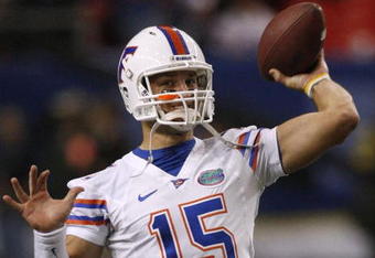 ATLANTA - DECEMBER 5:  Quarterback Tim Tebow #15 of the Florida Gators awarms up gainst the Alabama Crimson Tide during the SEC Championship game at Georgia Dome on December 5, 2009 in Atlanta, Georgia.  (Photo by Chris Graythen/Getty Images)