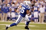 INDIANAPOLIS - DECEMBER 06:  Pierre Garcon #85 of the Indianapolis Colts runs with the ball during the NFL game against the Tennessee Titans at Lucas Oil Stadium on December 6, 2009 in Indianapolis, Indiana. The Colts won 27-17.  (Photo by Andy Lyons/Getty Images)