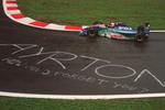 28 AUG 1994:  RUBENS BARRICHELLO OF BRAZIL PASSES THE TRIBUTE TO FORMER WORLD CHAMPION AYRTON SENNA WRITTEN ON THE TARMAC DURING TODAYS QUALIFYING SESSION FOR THE FORMULA ONE BELGIAN GRAND PRIX IN SPA, BELGIUM.  Mandatory Credit: Mike Cooper/ALLSPORT